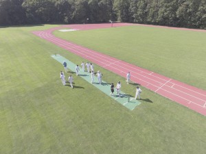 The players gsther on the drone landing strip